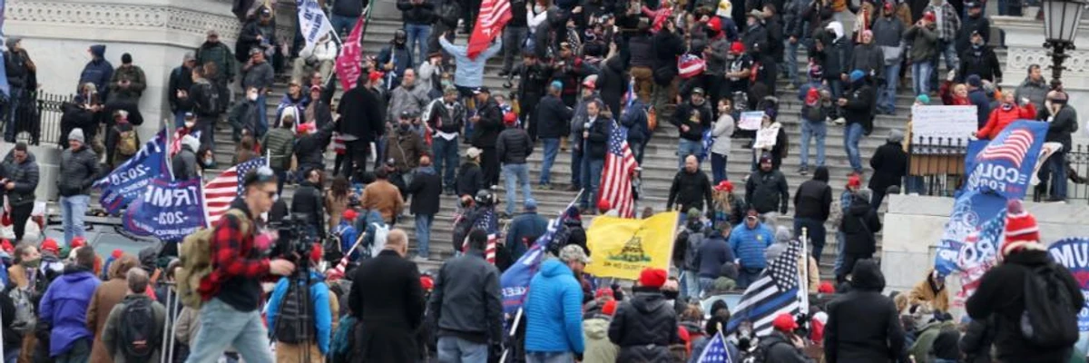 Pro-Trump rioters entered the U.S. Capitol building after mass demonstrations in the nation's capital during a joint session of Congress to ratify President-elect Joe Biden's 306-232 Electoral College win over President Donald Trump. (Photo: Tasos Katopodis/Getty Images)